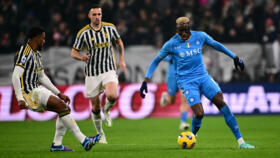 Napoli's Nigerian forward #09 Victor Osimhen (R) fights for the ball with Juventus' defender #03 Bremer during the match between Juventus and Napoli in Turin on December 8, 2023.